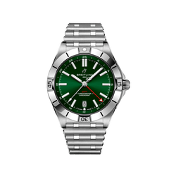 Relógio de pulso Breitling de aço inoxidável com mostrador verde, marcações brancas e prateadas, ponteiros luminosos e janela de data às 3 horas. O bisel tem números gravados e a pulseira é feita de elos de aço inoxidável combinando. O relógio possui certificação de cronômetro, conforme indicado pelo texto no mostrador.