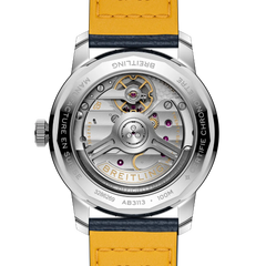 Tampa transparente com vista para o mecanismo do Relógio Breitling Top Time B31 38mm de caixa prateada, pulseira de pele azul escura com mostrador azul com rebordo branco