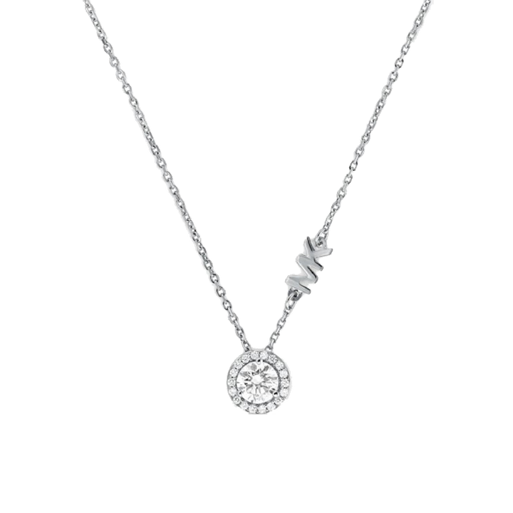 colar de prata banhado a ródio com zircónias da Michael Kors. O colar apresenta uma corrente delicada com um pingente circular incrustado com várias pequenas pedras de zircónia, criando um efeito cintilante. Acima do pingente, as iniciais da marca Michael Kors ‘MK’ estão integradas ao design em uma fonte estilizada, também adornada com pedras de zircónia para combinar com o pingente.