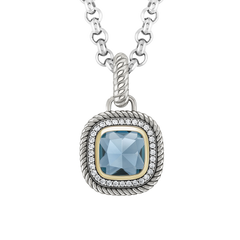 Pendente TASHI London Blue I prateado, com zircónias brancas, zircónia grande azul, detalhe dourado e rebordo cruzado