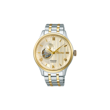 Relógio Seiko Presage Japanese Garden 41.8mm de pulseira prateada com duas linhas douradas, de caixa e mostrador dourados com indicação de dia da semana e mês