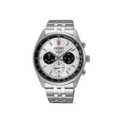 Um relógio de pulso de aço inoxidável com pulseira prateada e mostrador preto. O relógio tem uma caixa redonda com bordas texturizadas, lembrando uma engrenagem ou roda dentada, sugerindo que pode ter recursos adicionais como cronógrafo ou taquímetro. Os ponteiros ou números no mostrador não são visíveis devido a uma porção central obscurecida.