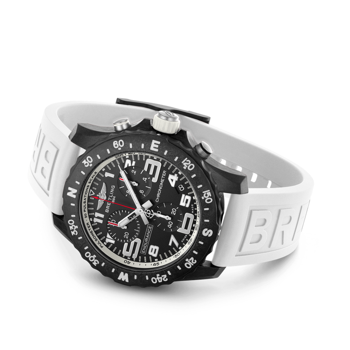 Relógio Professional Endurance Pro 44mm pulseira silicone branca e caixa preta deitado de lado