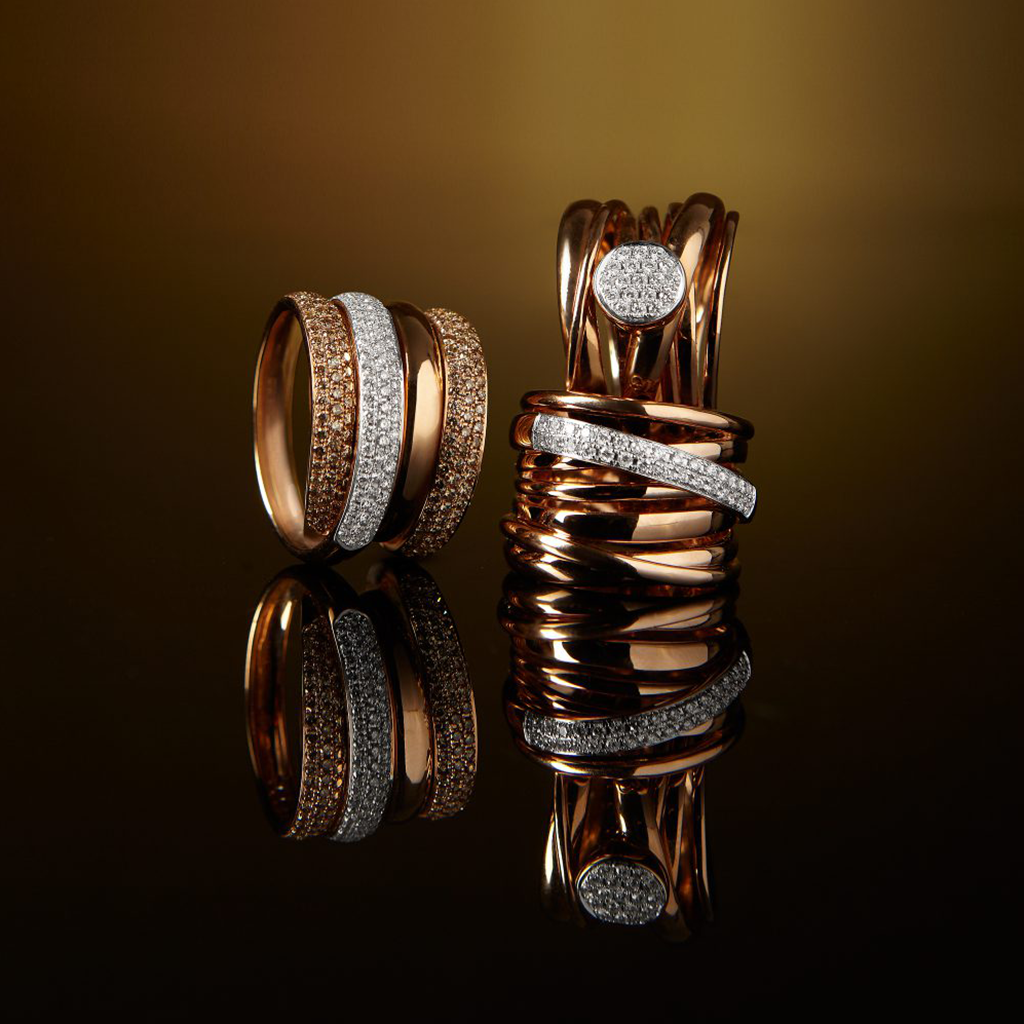 imagem de vários anéis da colecção Claire Rose Gold com diamantes
