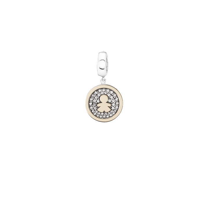 Um pendente redondo de prata e ouro com pedras de zircônia. O pendente apresenta um padrão circular central de zircónias incrustadas em ouro, cercado por um anel de zircónias menores embutidas em prata, criando um design contrastante e elegante adequado para vários tipos de joias.